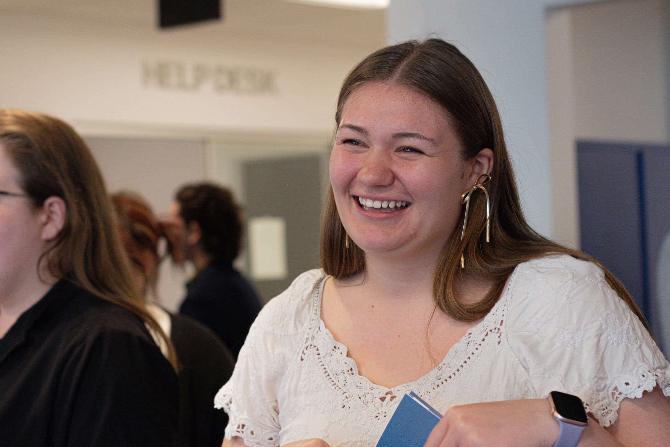 A young woman smiling