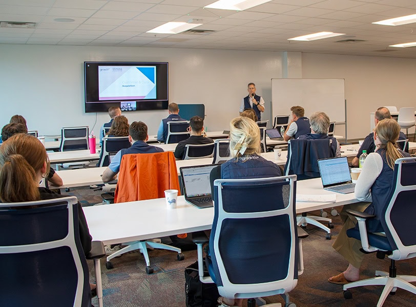 A group watching a presentation in the Accelerator at Golisano Institute.