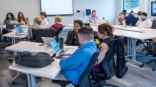 A group of students in the classroom.