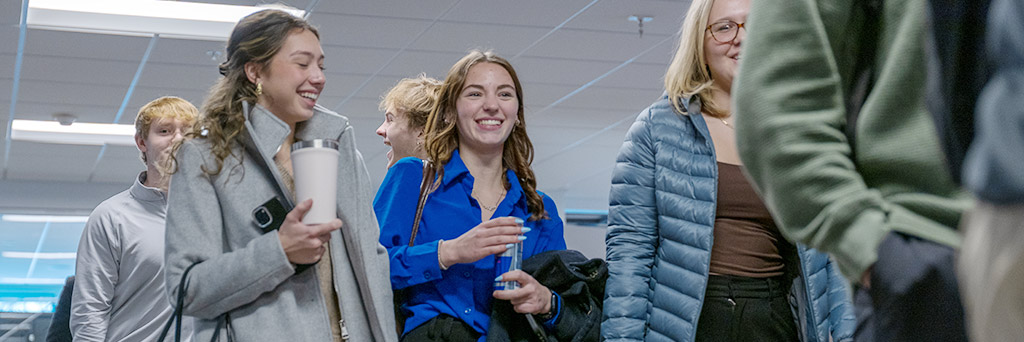 A group of students walking out of class.