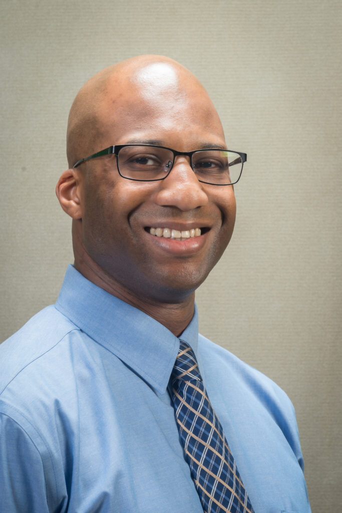 A portrait photo of Quent Rhodes, the newly appoint vice president of finance and administration at Golisano Institute